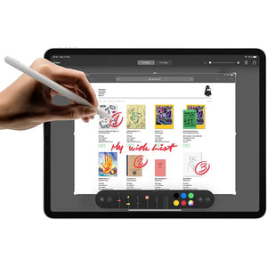An iPad Pro 2nd gen 11-inch showing only the front display, with a hand using the Apple Pencil to make an edit on the screen, focusing on the interaction between the hand and the device